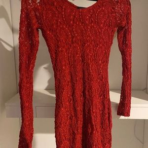 Skin tight red long sleeve mini dress